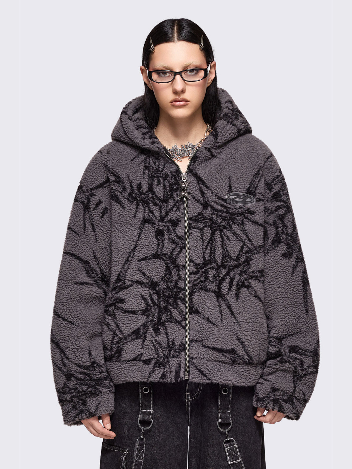 Grey fleece borg hoodie jacket featuring all over black thorns design.