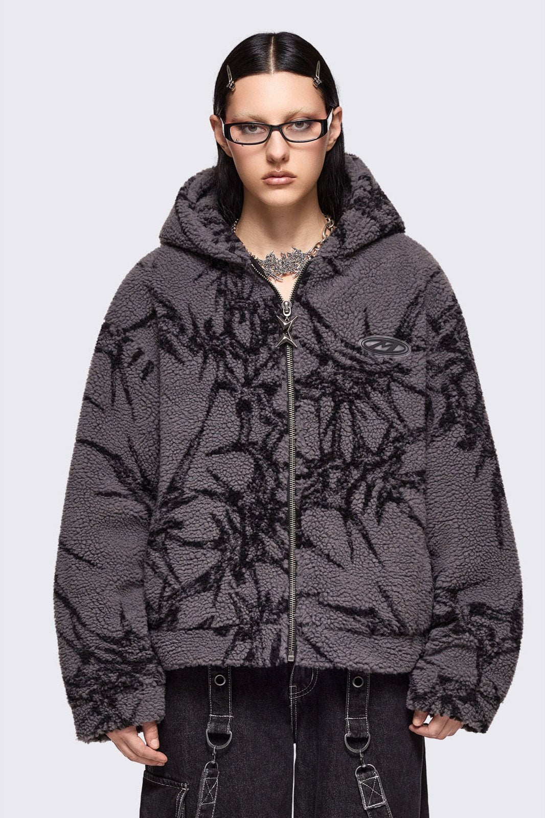 Grey fleece borg hoodie jacket featuring all over black thorns design.