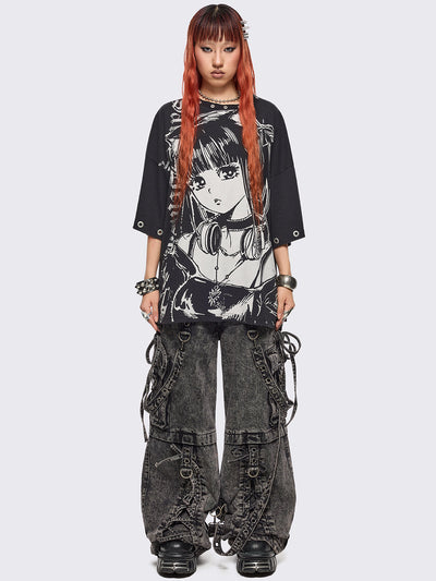 Black oversized t-shirt with anime girl graphic front print and silver eyelets trims.