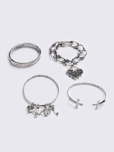 Set of 4 bracelets with cross design and heart pendants