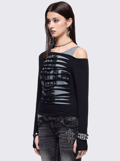 Black and grey long sleeve layered cold shoulder top featuring a front cut-out slash details and a grunge graphic print. 