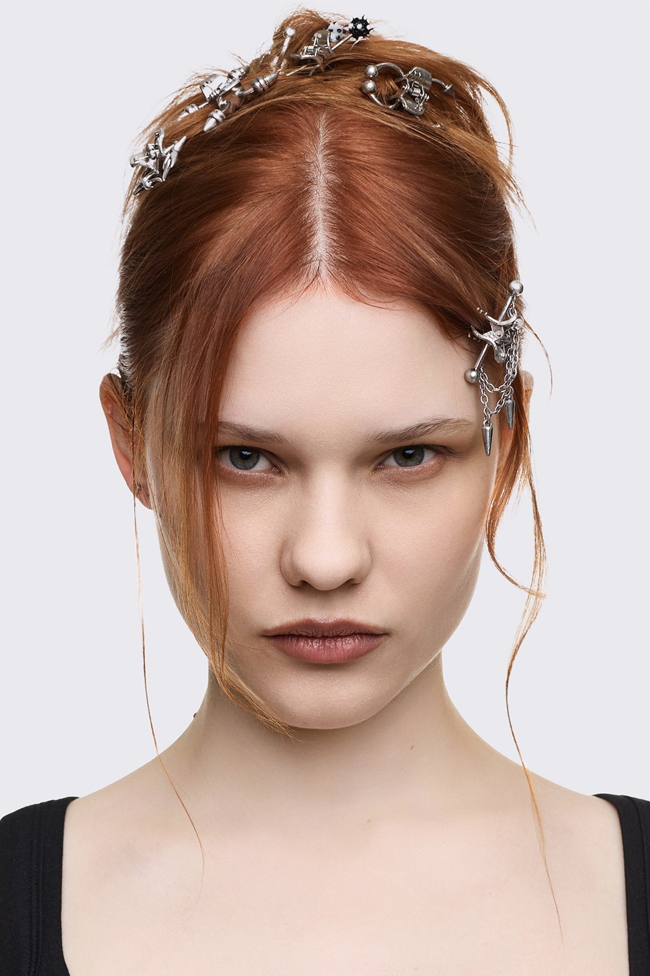 Mini claw hair clips in antique silver metal with spike, chain and sigil details in a cyber sigilism style.