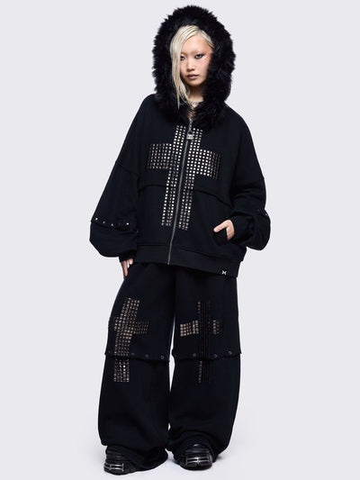 Black sweatpants with silver studded cross, "Reverse" patch back and detachable-leg .