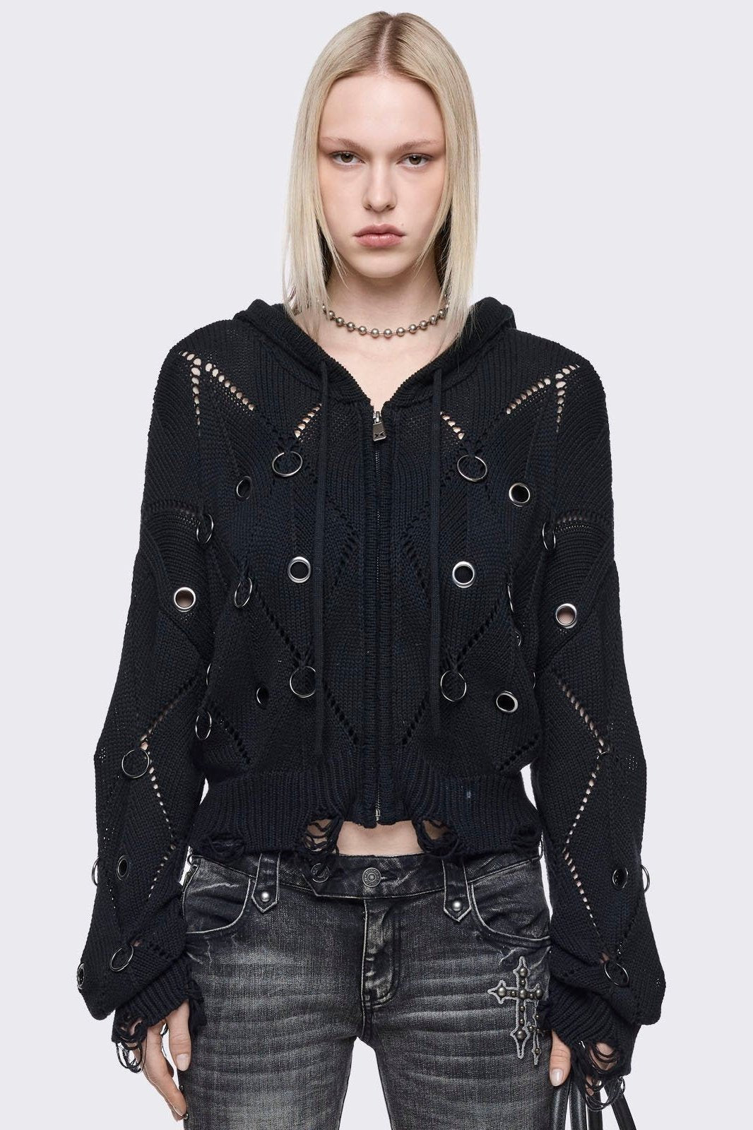 Black hood knitted cardigan with silver eyelets, o-ring, open-weave and distressed rib details.