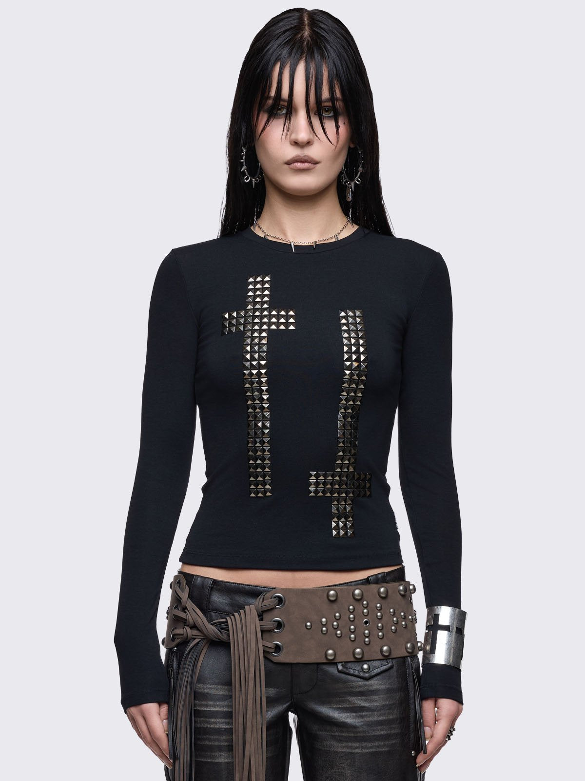 Black long sleeve top with studded crosses. 