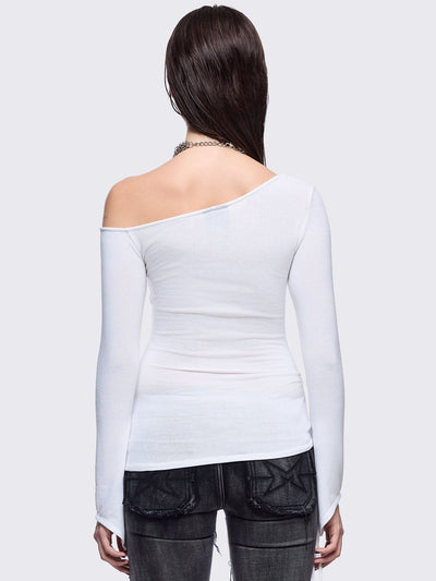 White off-shoulder top featuring a black chunky cross with silver square studs and ruched tie side detail.