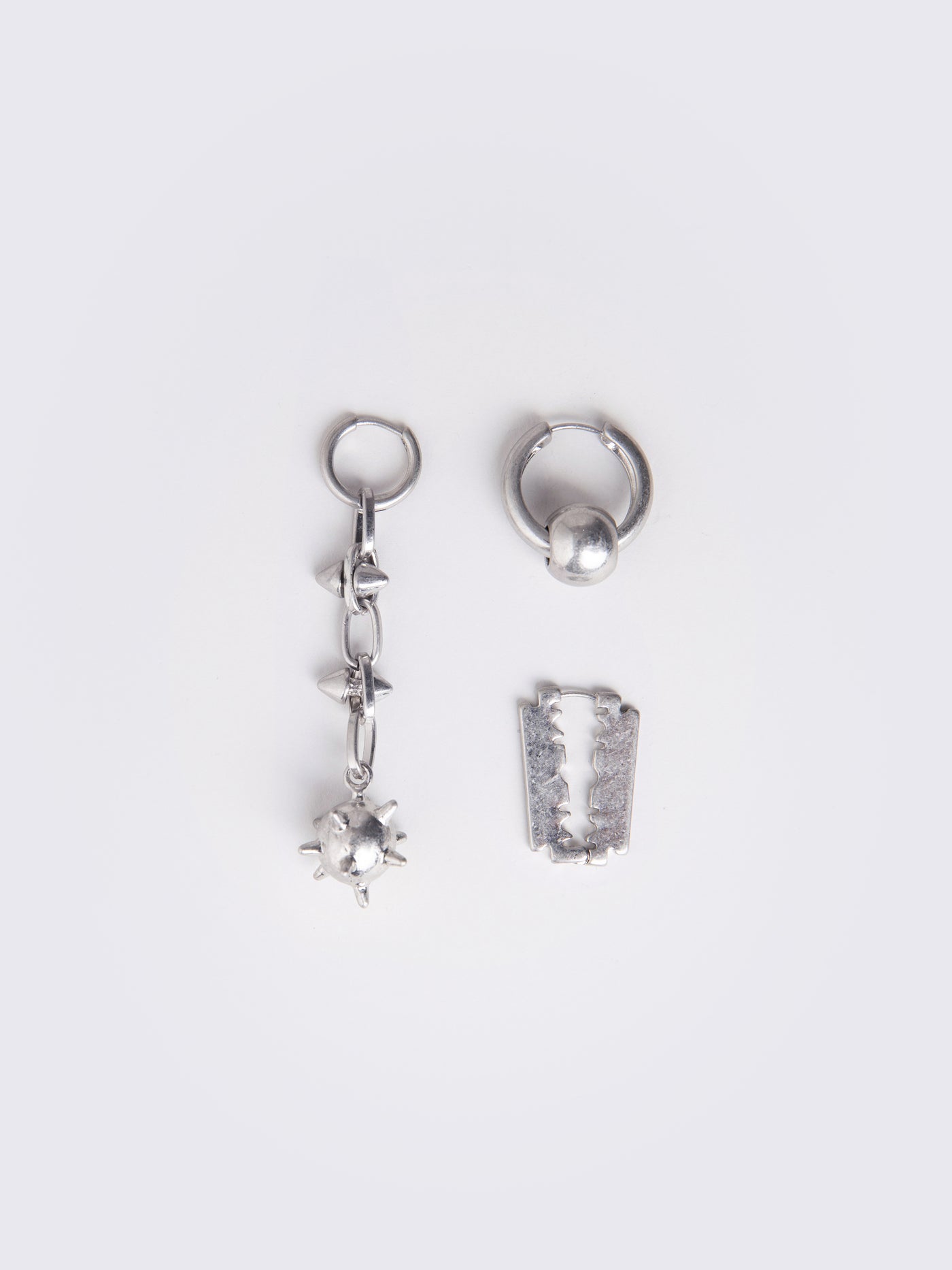 silver 3 pieces earring set  with spiked ball pendant and razor blade.