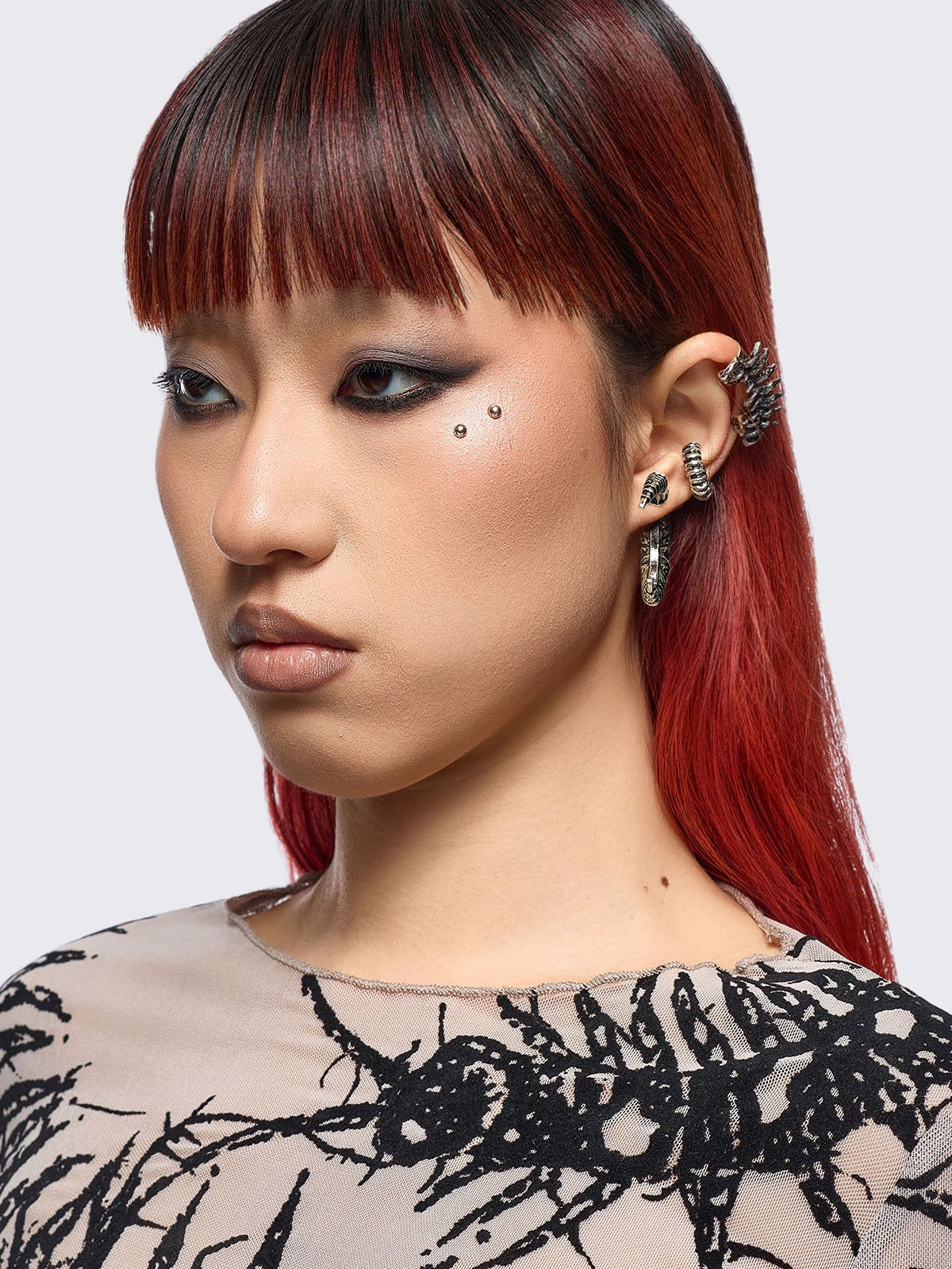 Silver 5 pc chunky earring set with centipede and spine designs. Chunky ear cuffs style.