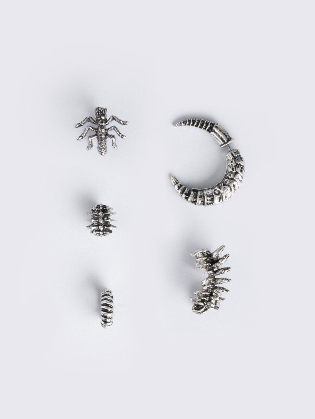 Silver 5 pc chunky earring set with centipede and spine designs. Chunky ear cuffs style.