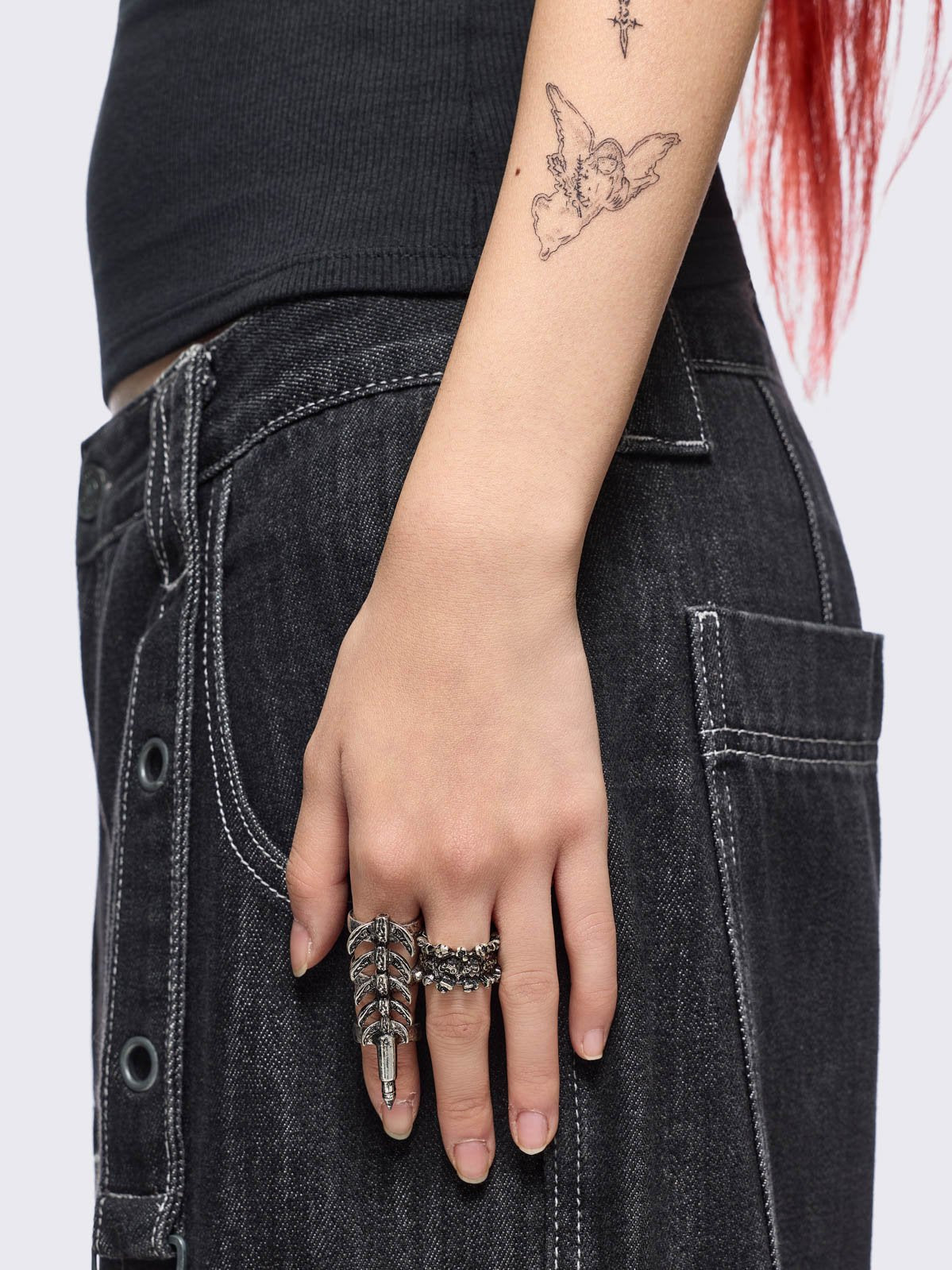 Set of 5 silver rings with centipede, spine and spike designs. 