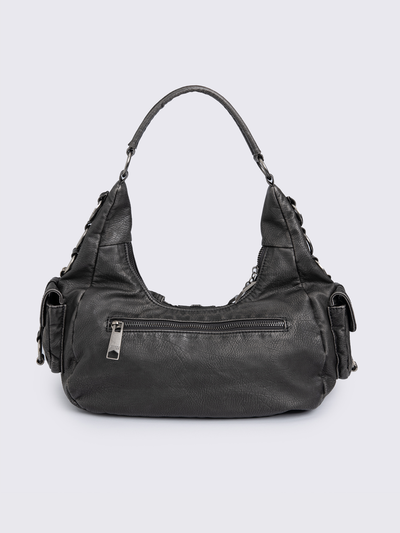 Black washed faux leather shoulder bag with silver star clasp, hardware details and multiple pockets.