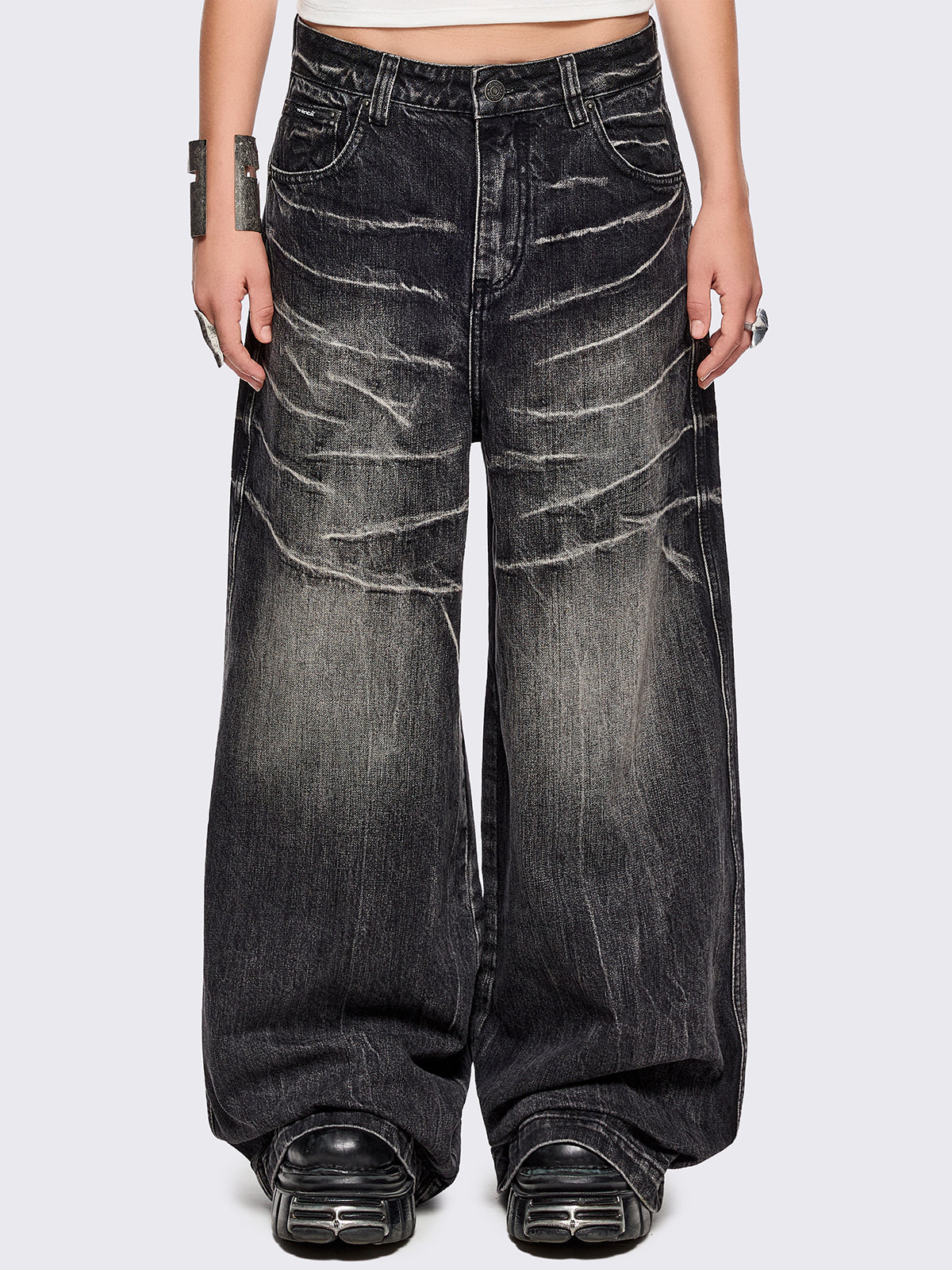 Black washed baggy jeans with grey overdye and distressed wrinkle-effect.