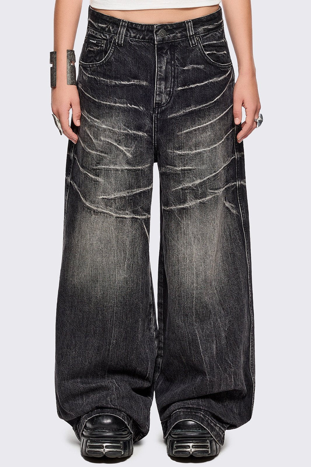 Black washed baggy jeans with grey overdye and distressed wrinkle-effect.