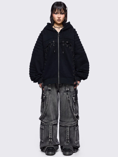 Black zip up hoodie jacket featuring a moto pintuck panels and front lace corset details. 