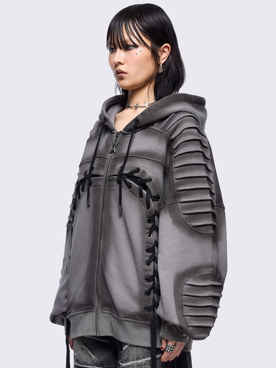 Grey washed zip up hoodie jacket featuring a moto pintuck panels and front lace corset details. 