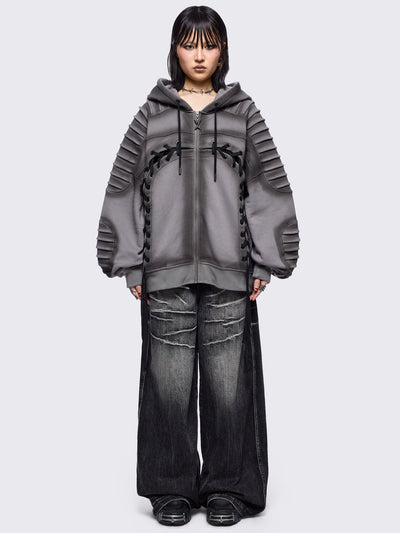 Grey washed zip up hoodie jacket featuring a moto pintuck panels and front lace corset details. 