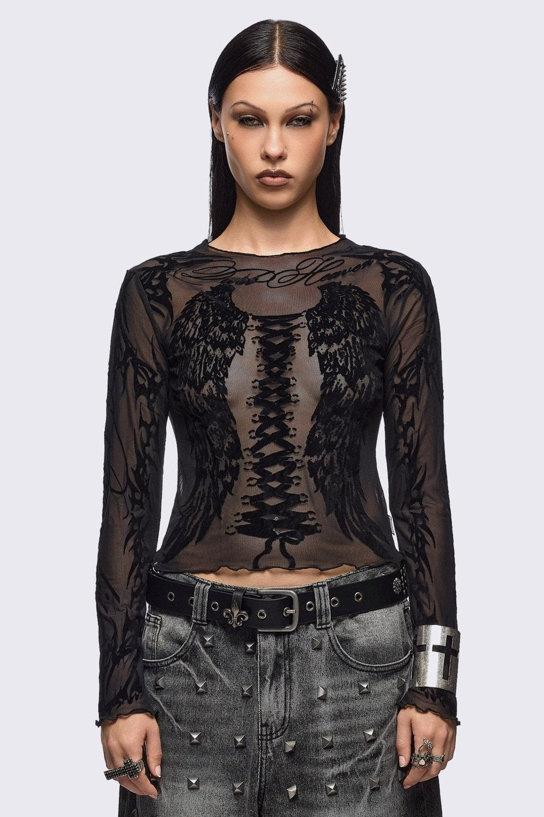 Black mesh top with winged corset and sigilism graphic print.