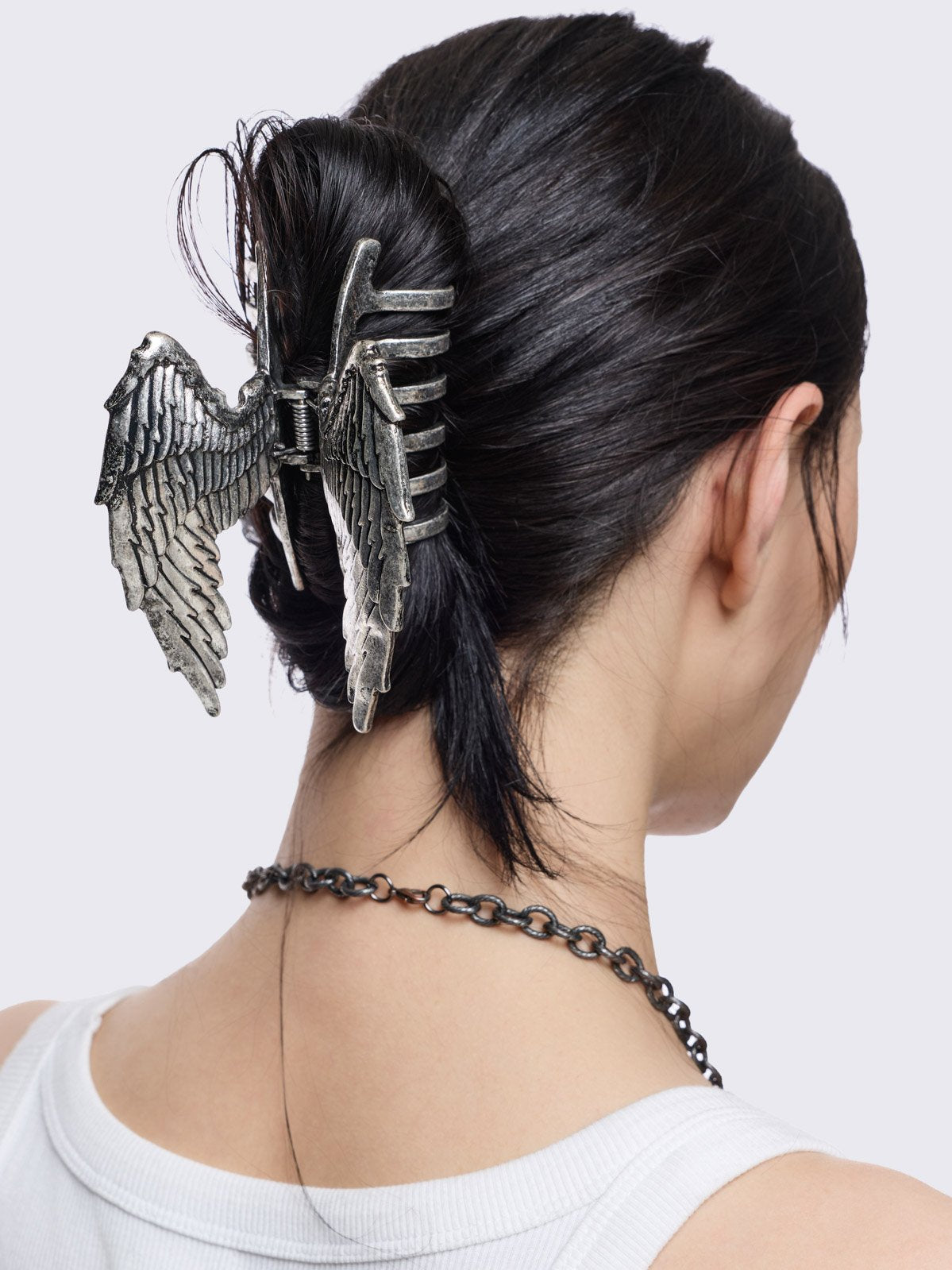Silver metal hair claw clip with wings design
