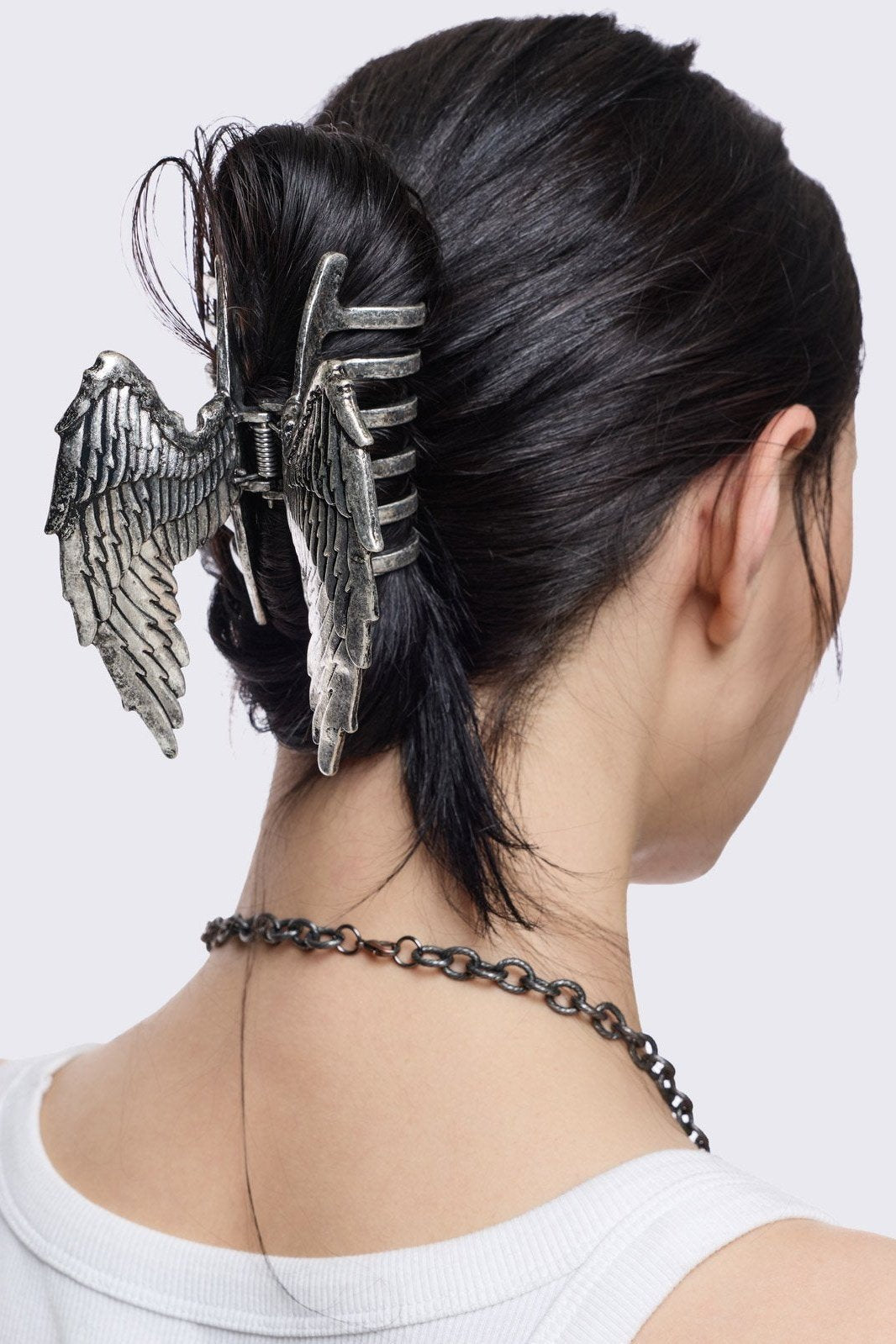 Silver metal hair claw clip with wings design