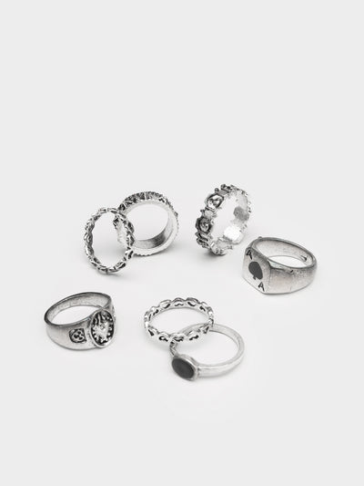 Silver rings set with stones in black