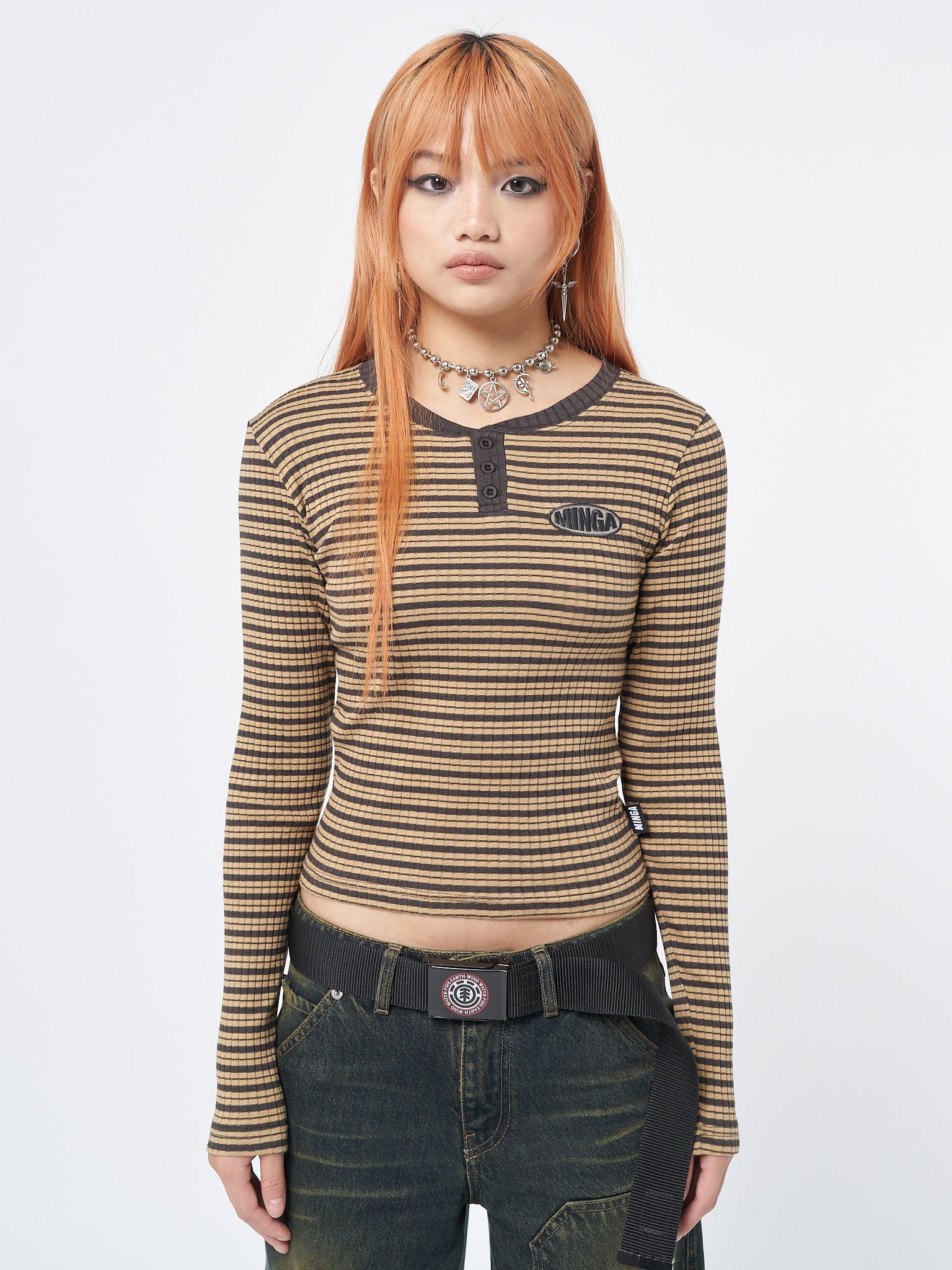Long sleeve ribbed top with half button placket and al over stripes in brown and honey 