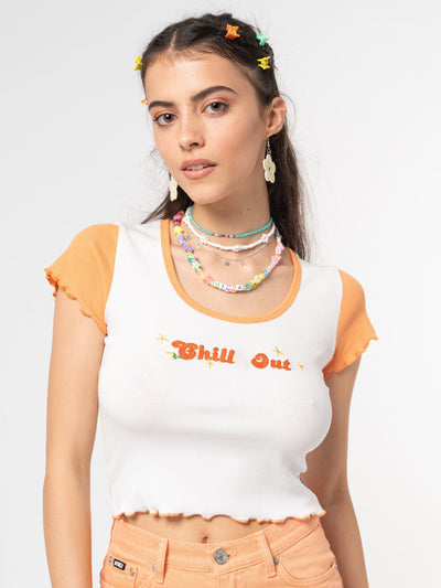 Crop ribbed top in white with contrast sleeves in orange