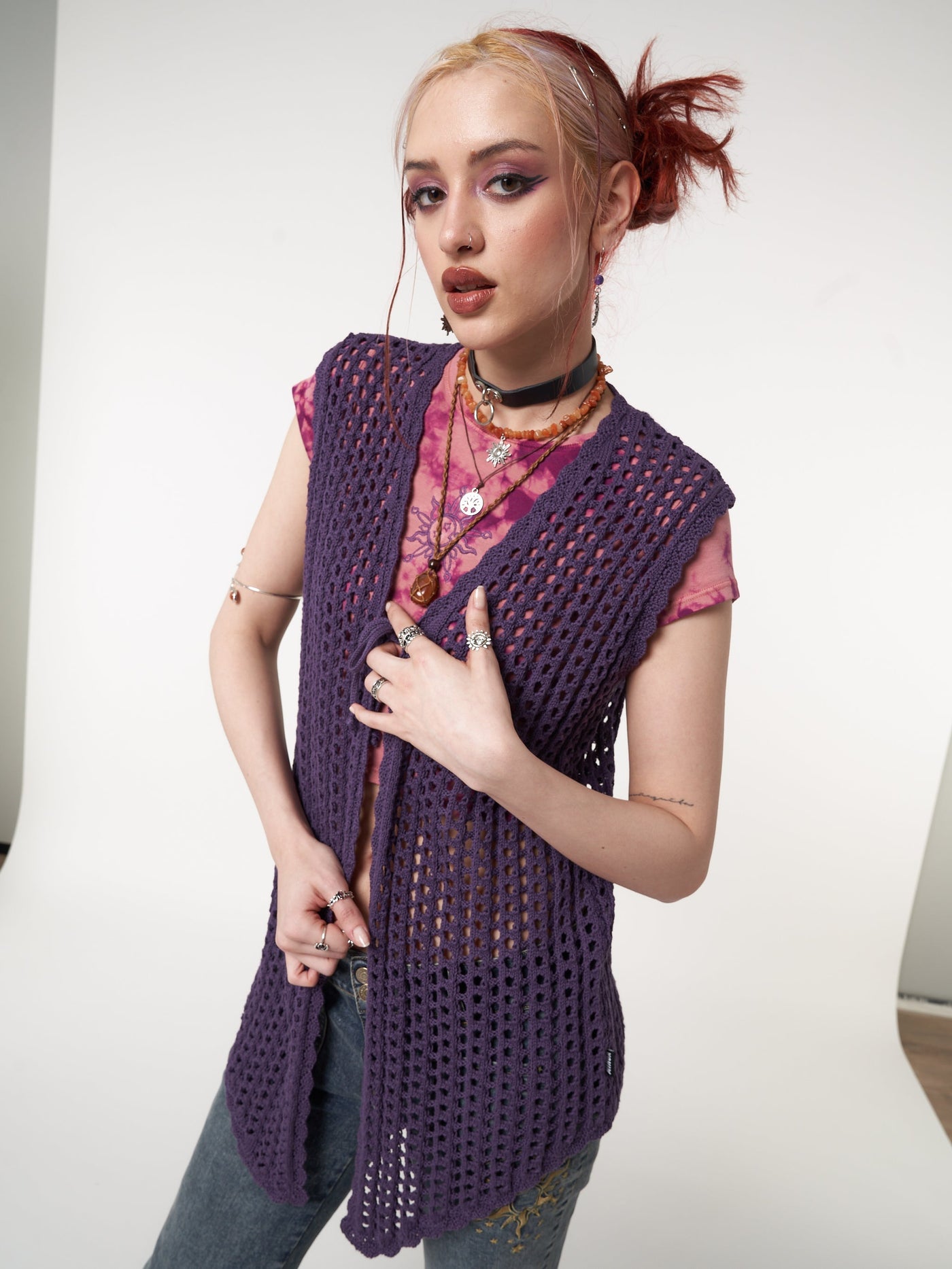 Tie front vest cardigan in purple featuring crochet style knit pattern