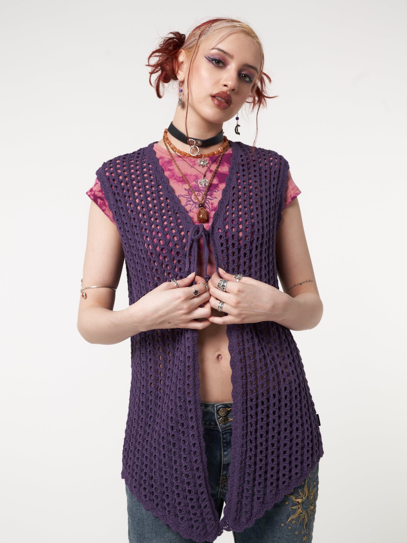 Tie front vest cardigan in purple featuring crochet style knit pattern